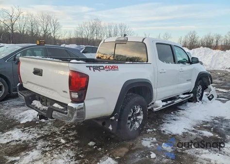 2018 Toyota Tacoma Double Cab z USA, uszkodzony, nr VIN 3TMCZ5ANXJM150187